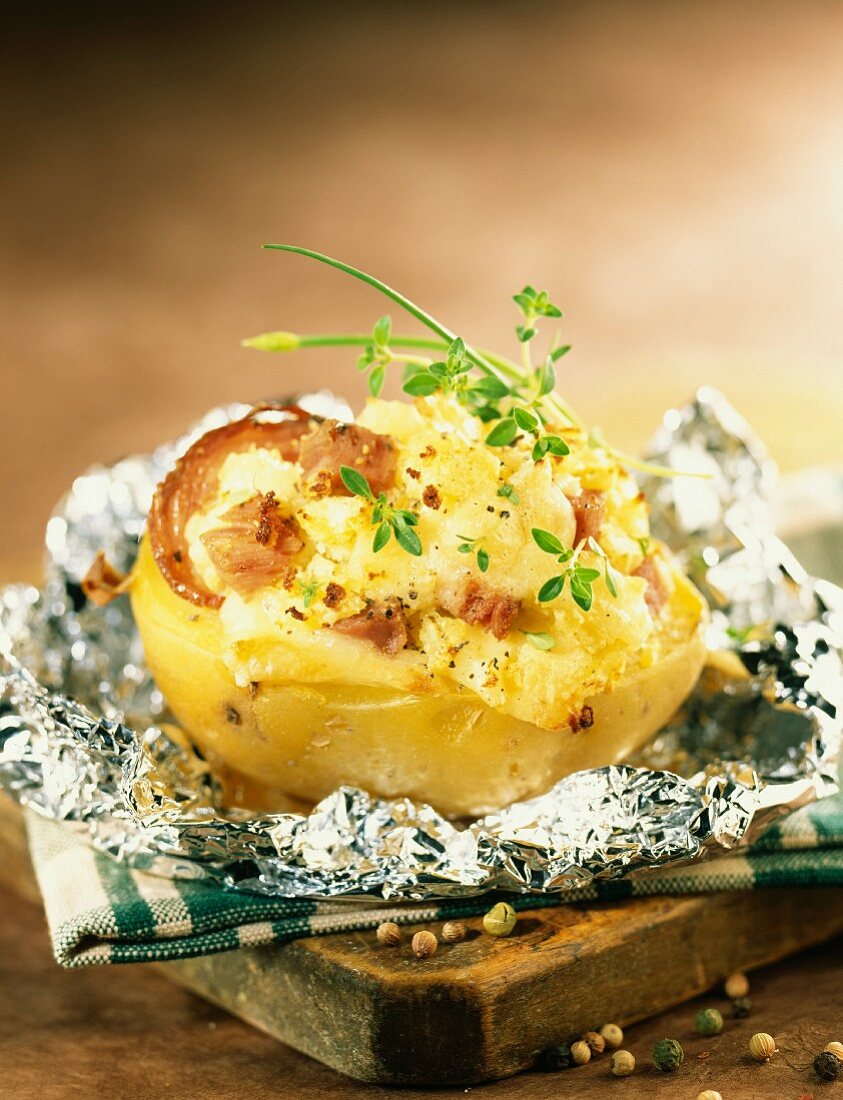 Baked potato filled with cantal cheese