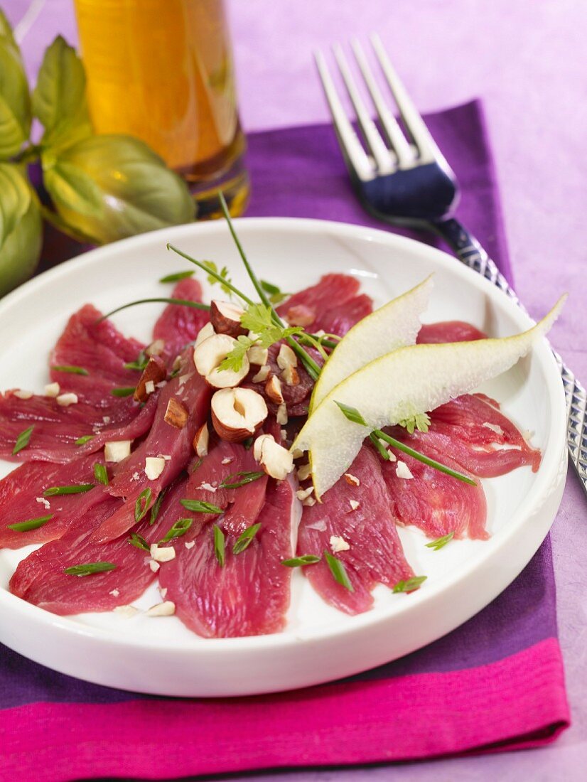 Beef carpaccio with pears