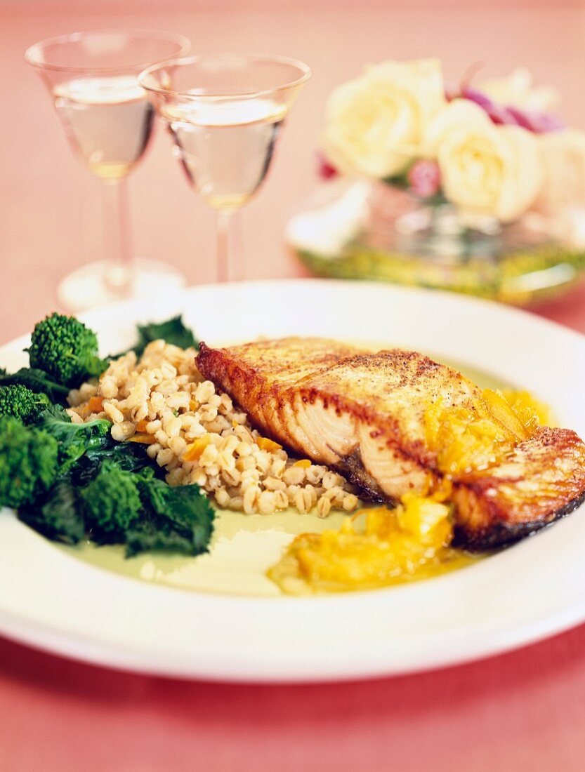 Fried salmon with wheat risotto and broccoli