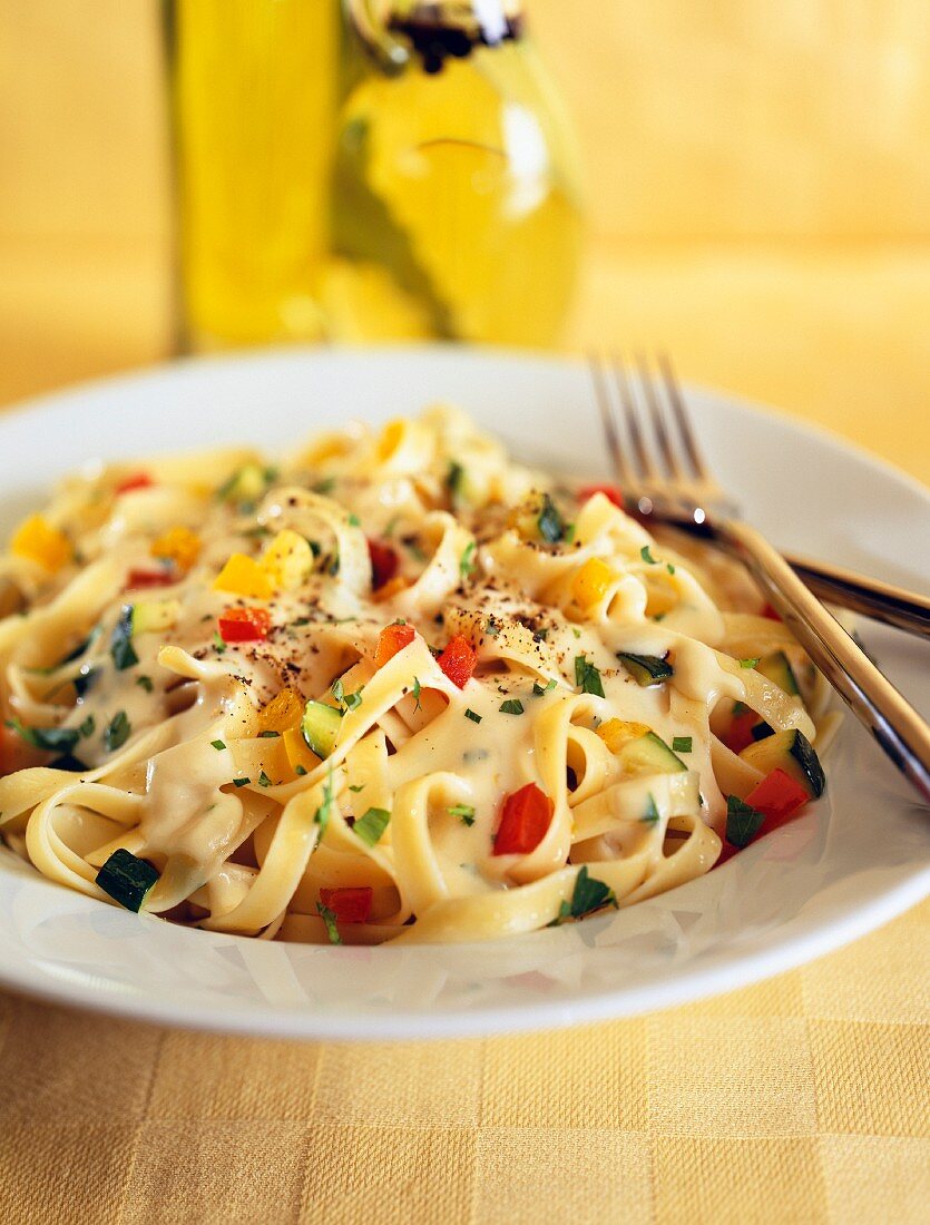 Tagliatelle with vegetables and a creamy sauce