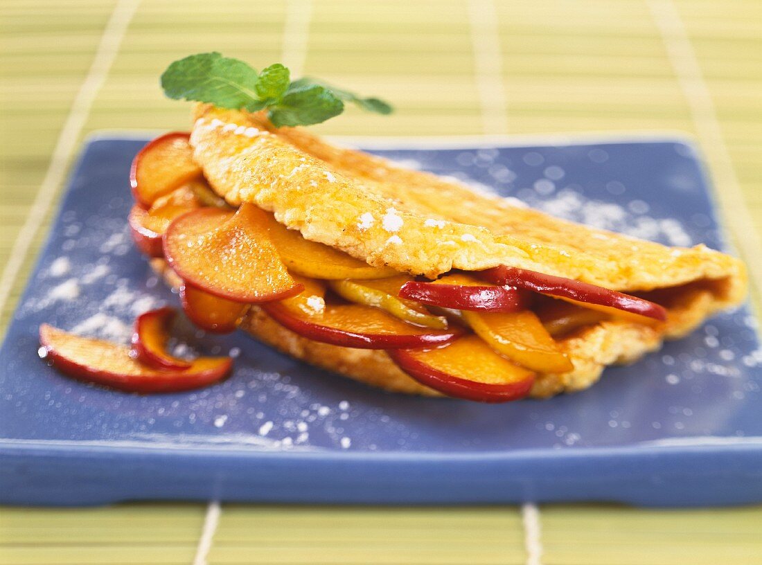 Omelette with pork and nectarines