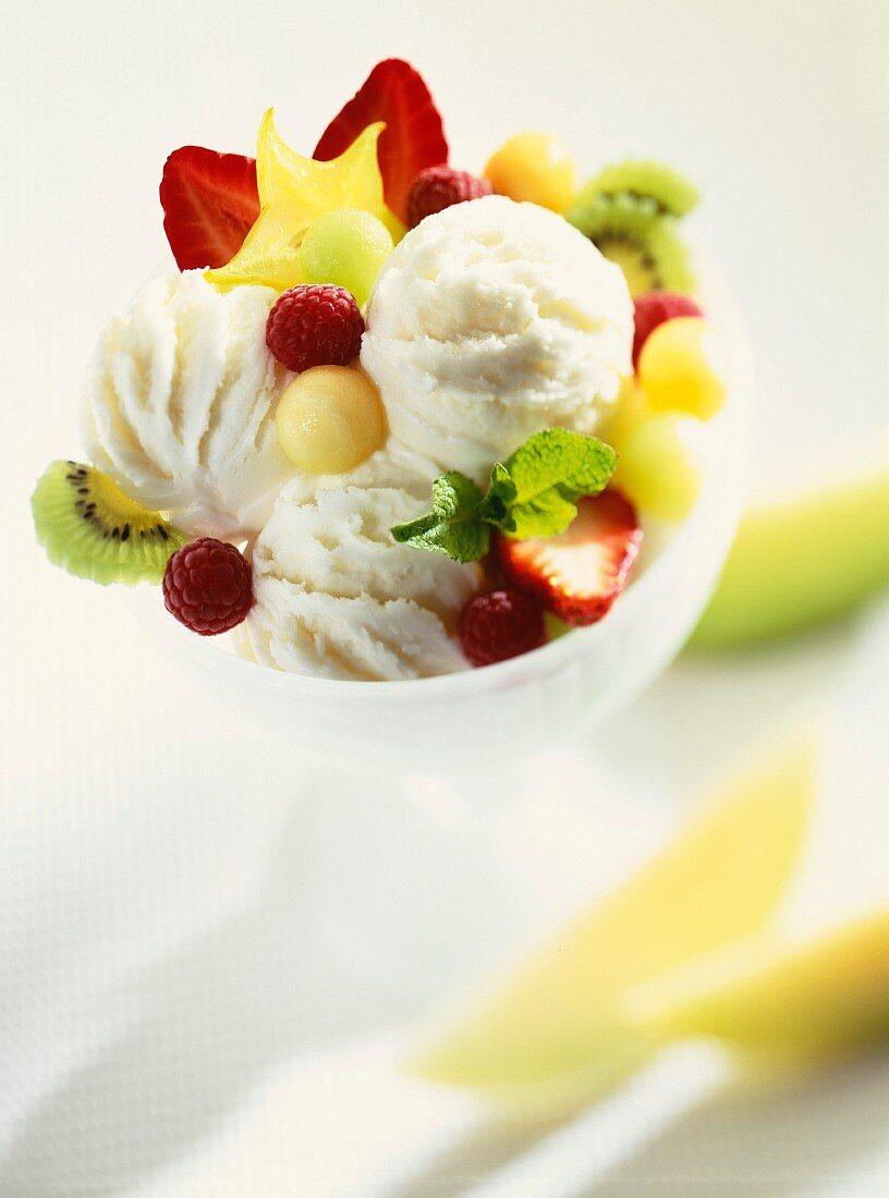 An ice cream sundae with fresh fruit