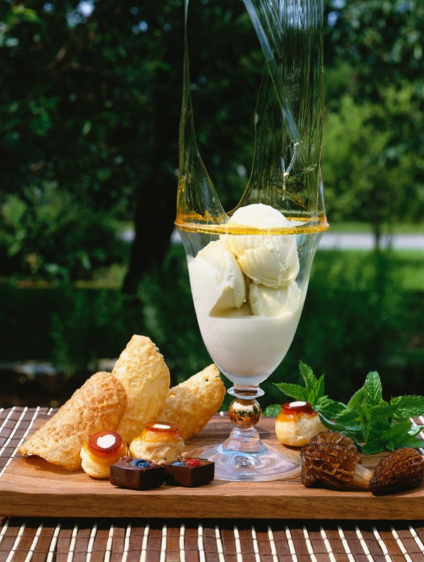 Vanilla ice cream with caramel, cones, profiteroles and morel mushrooms