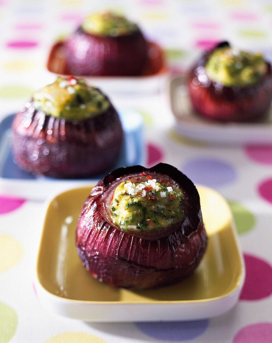 Stuffed red onions with green vegetables