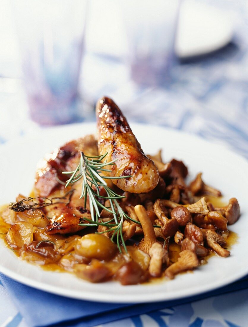 Glazed guinea-fowl with mirabelle plums,mushrooms and rosemary