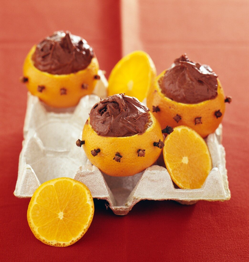 Milk chocolate cream served in mandarin halves