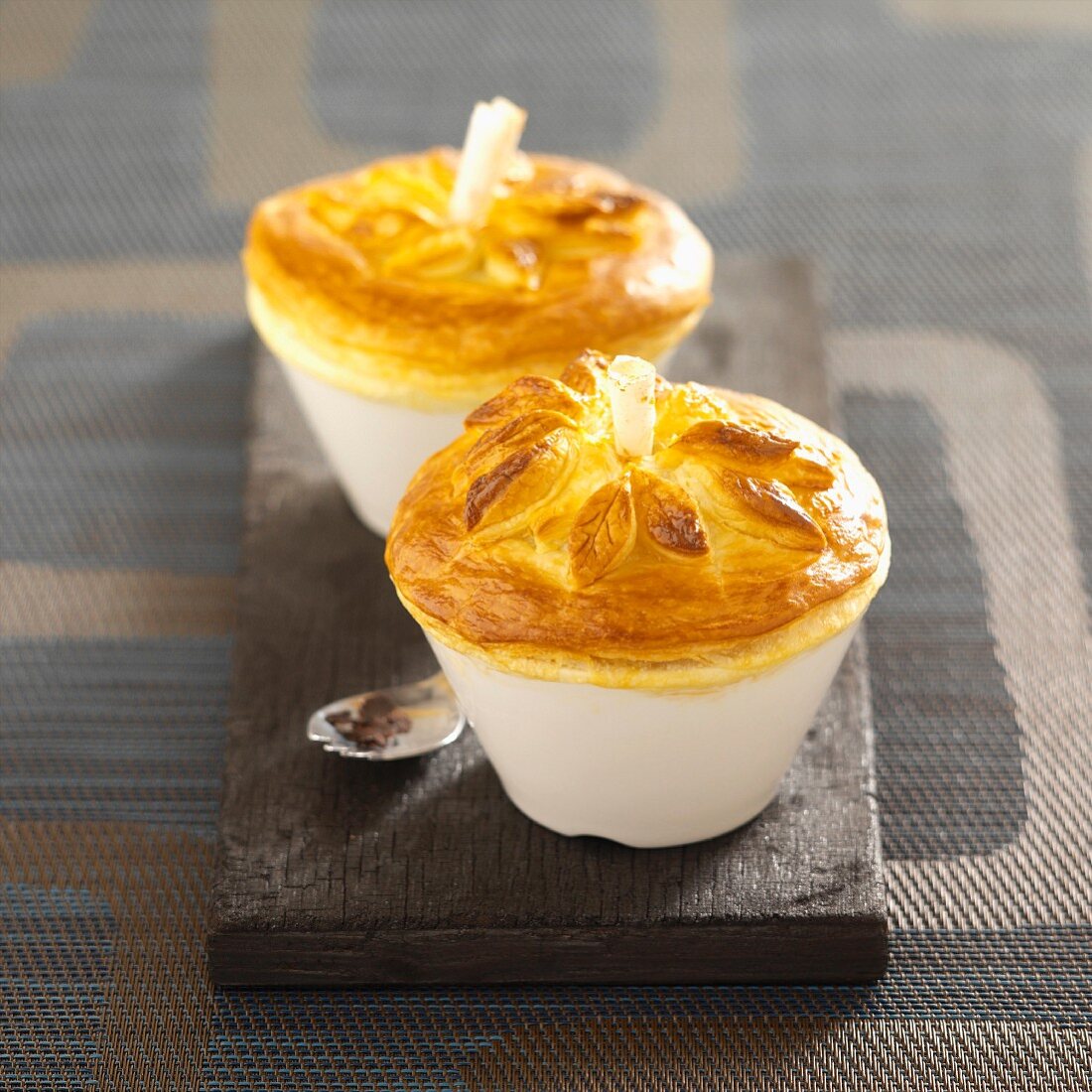 Meat pies with truffles and a bread topping