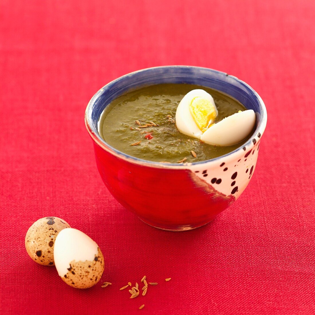 Vegetable soup with a quail's egg