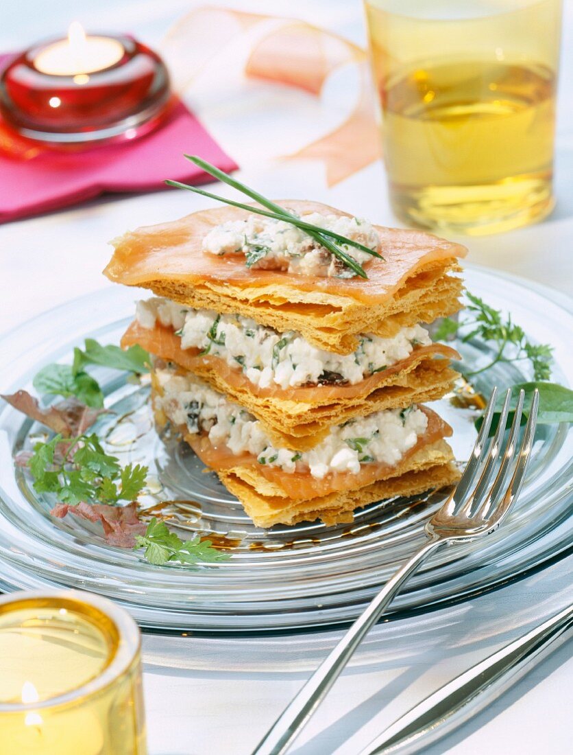 A layered tartlet with smoked salmon and cream cheese