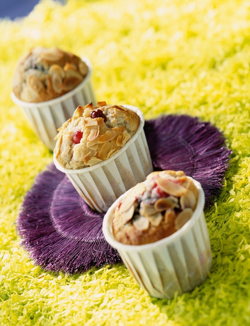 Fruits of the forest muffins with flaked almonds