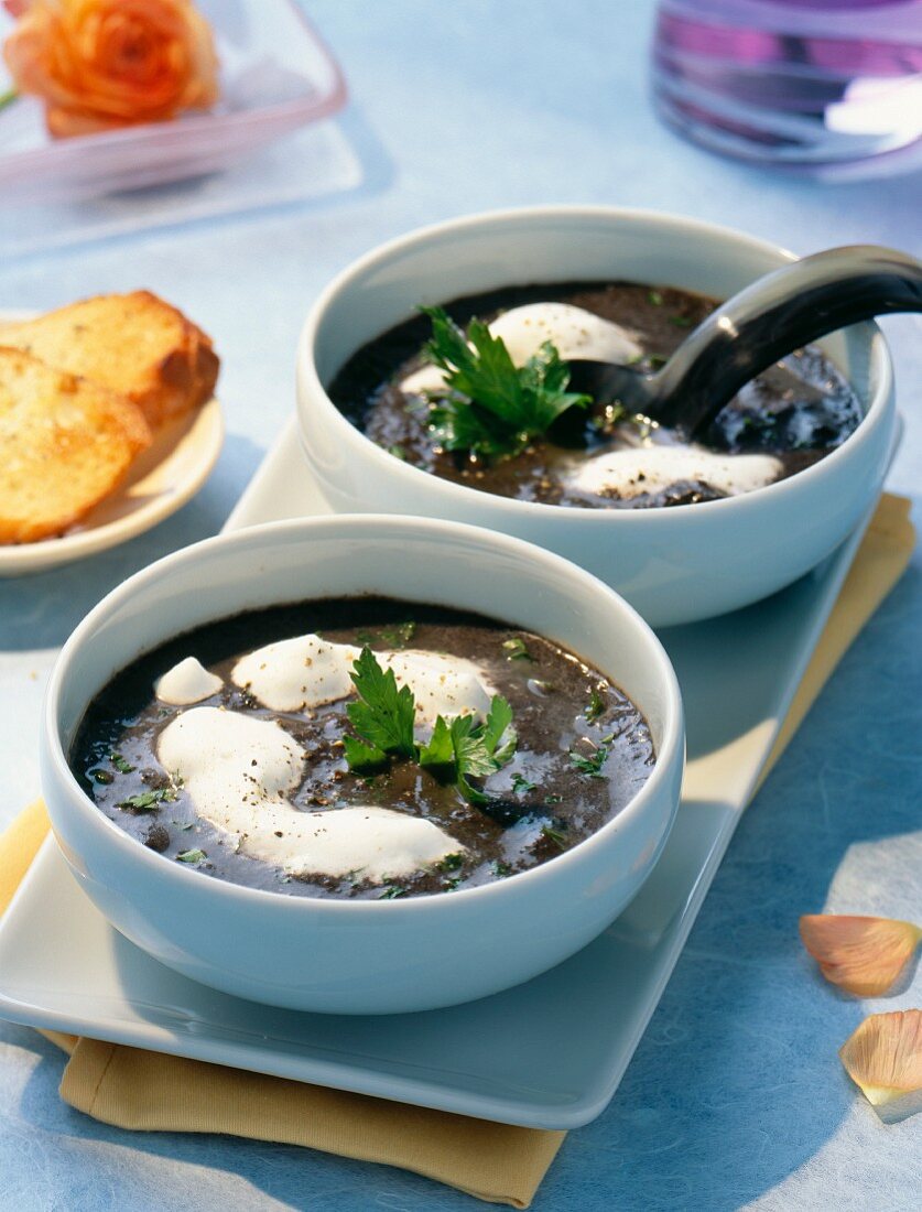 Mushroom soup topped with cream