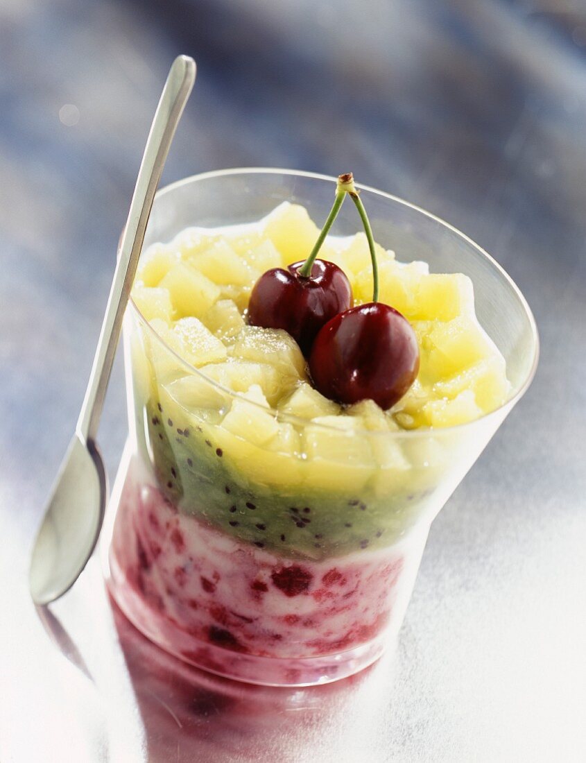 Iced fruit soup with cherries and kiwis