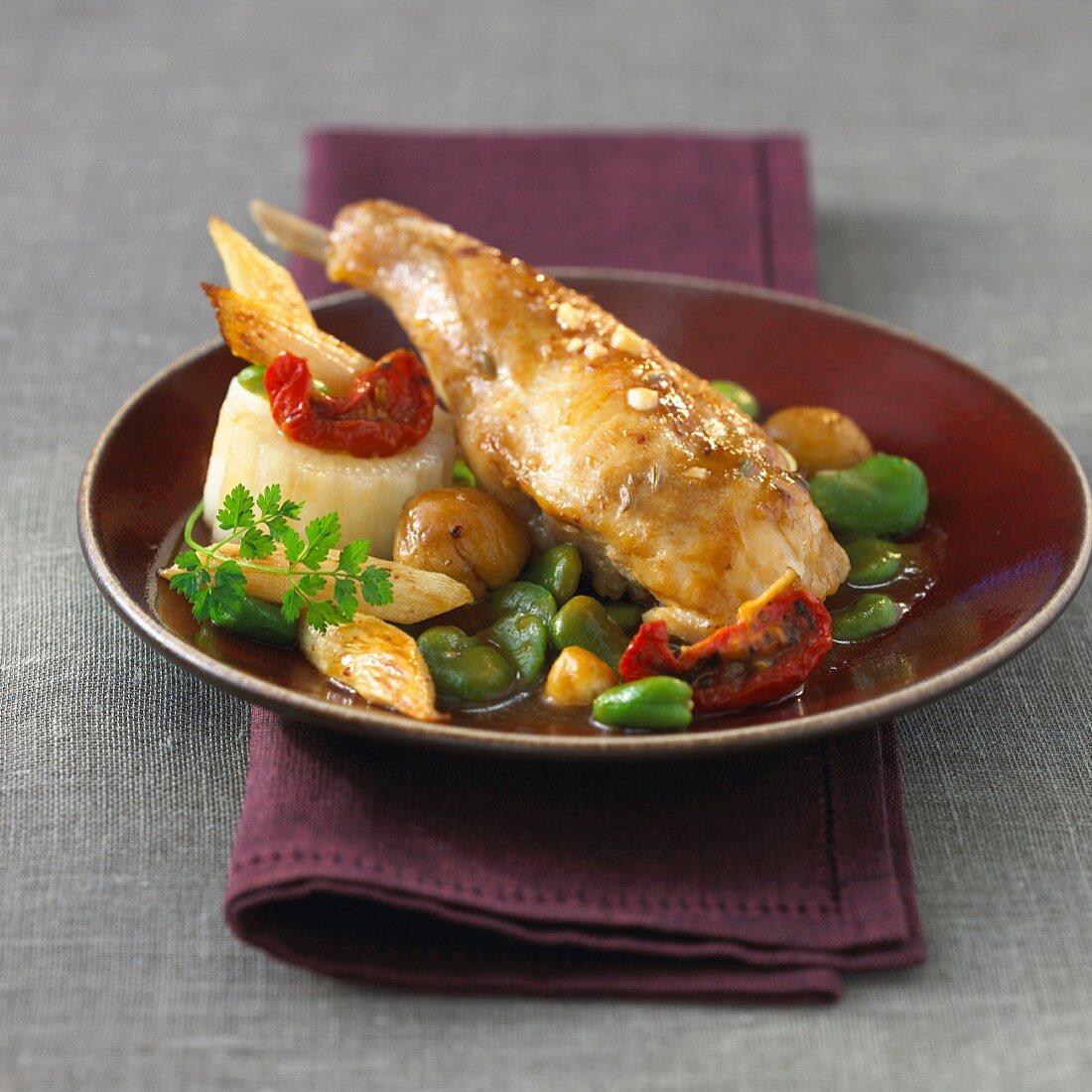 Roast rabbit with broad beans and dried tomatoes