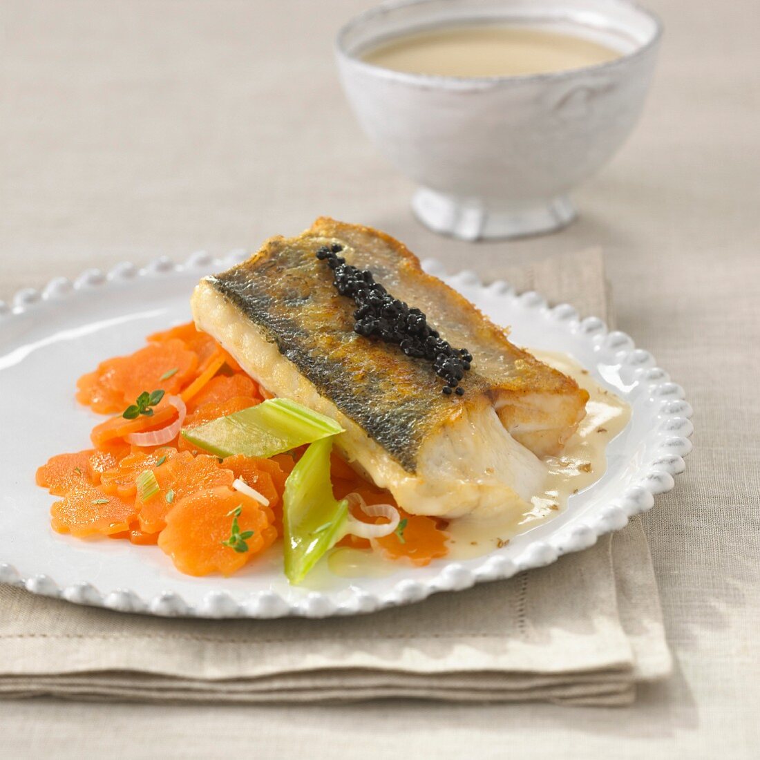 Fried zander fillet with caviar and lobster sauce
