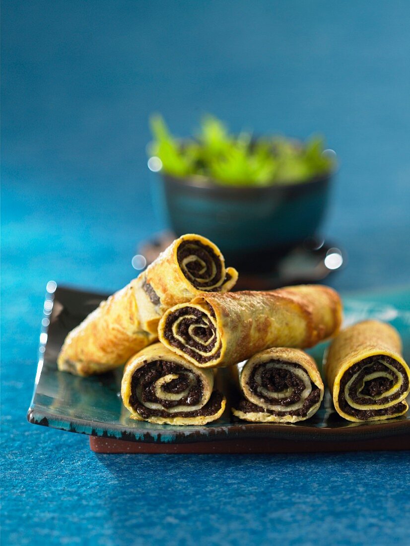 Omelette rolls filled with tapenade