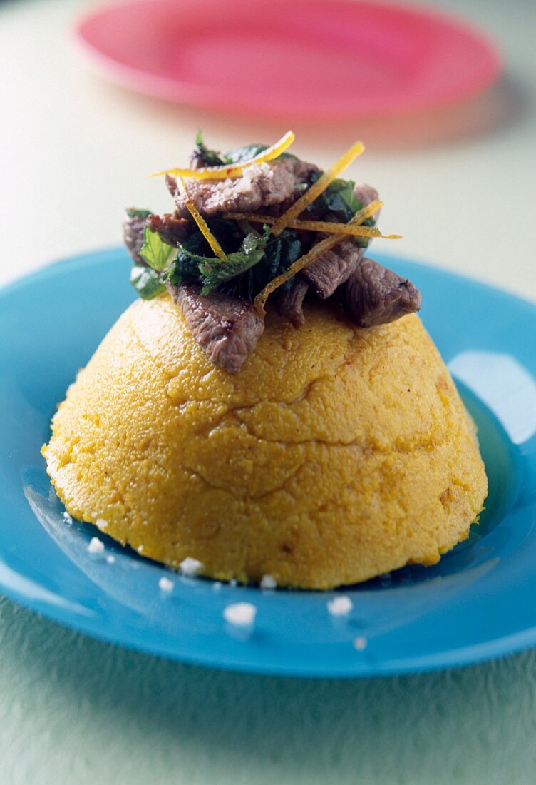 Moist polenta with orange juice and curry,lamb stew with ginger and honey