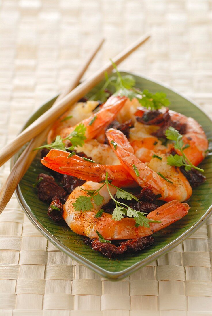 Pan-fried gambas with herbs and dried tomatoes