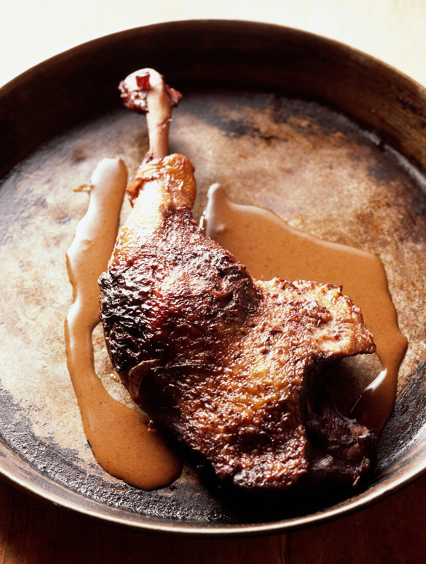 Leg of duck conserve with red wine sauce