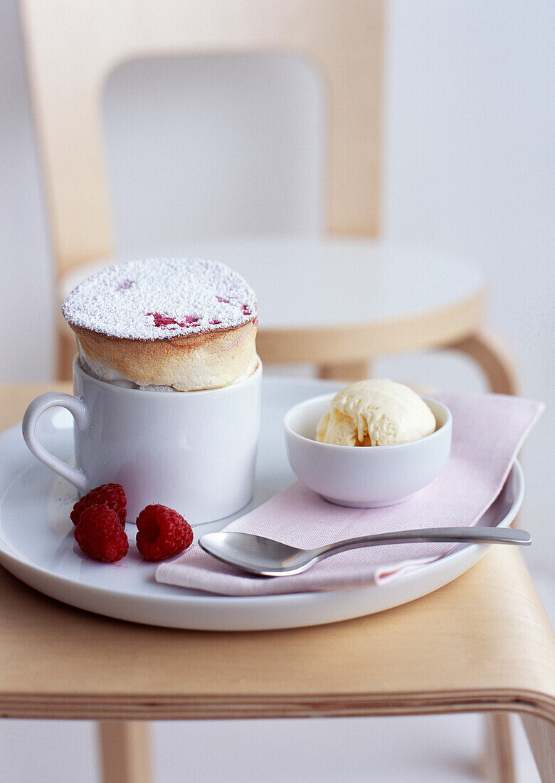 Raspberry soufflé with vanilla ice cream