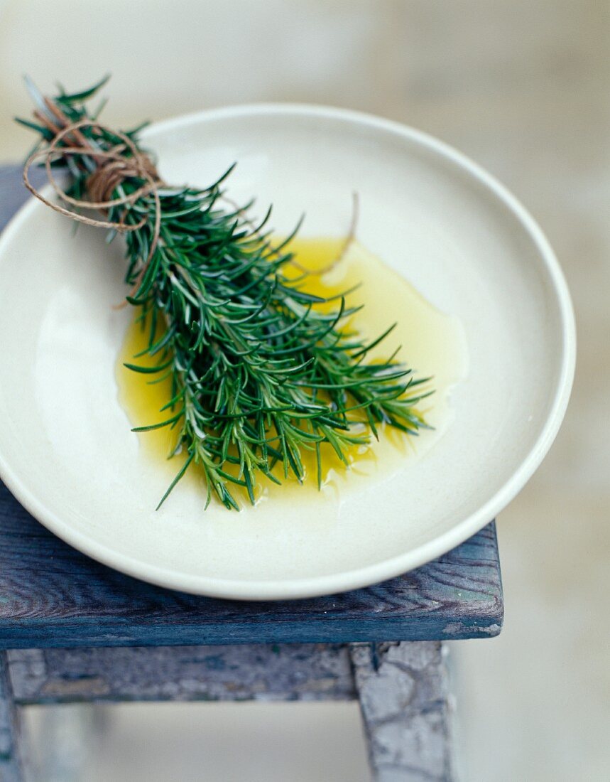 Brush made with rosemary dipped in olive oil