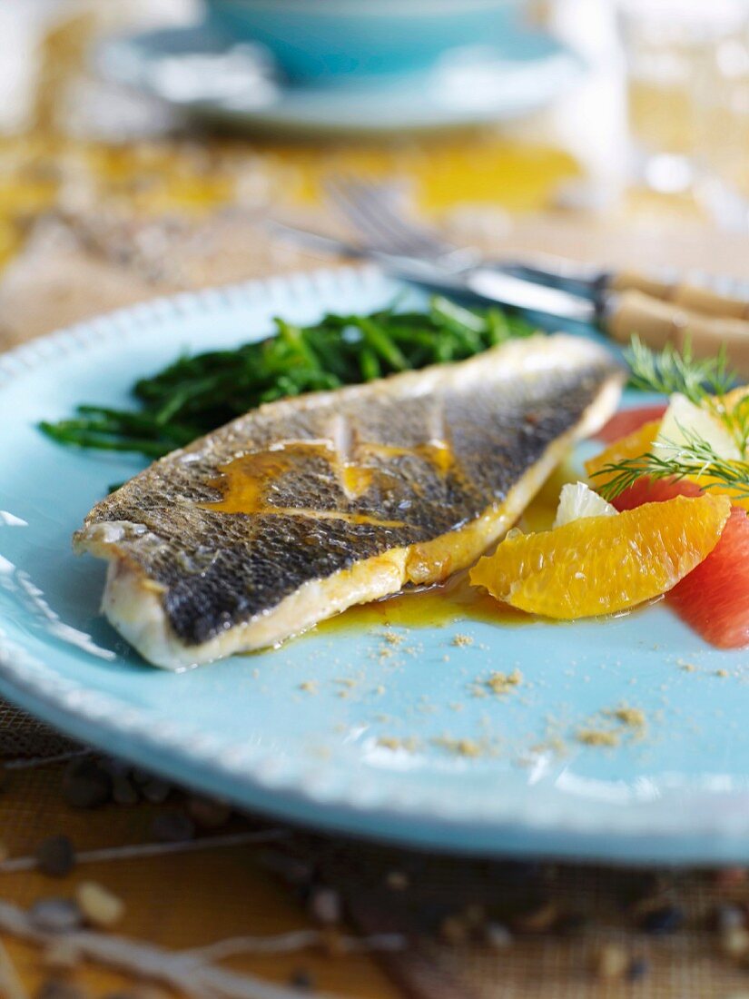 Bass fillet with spices and citrus fruit sauce