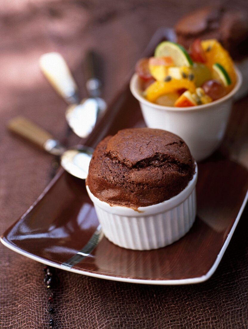 Chocolate soufflé and fruit salad