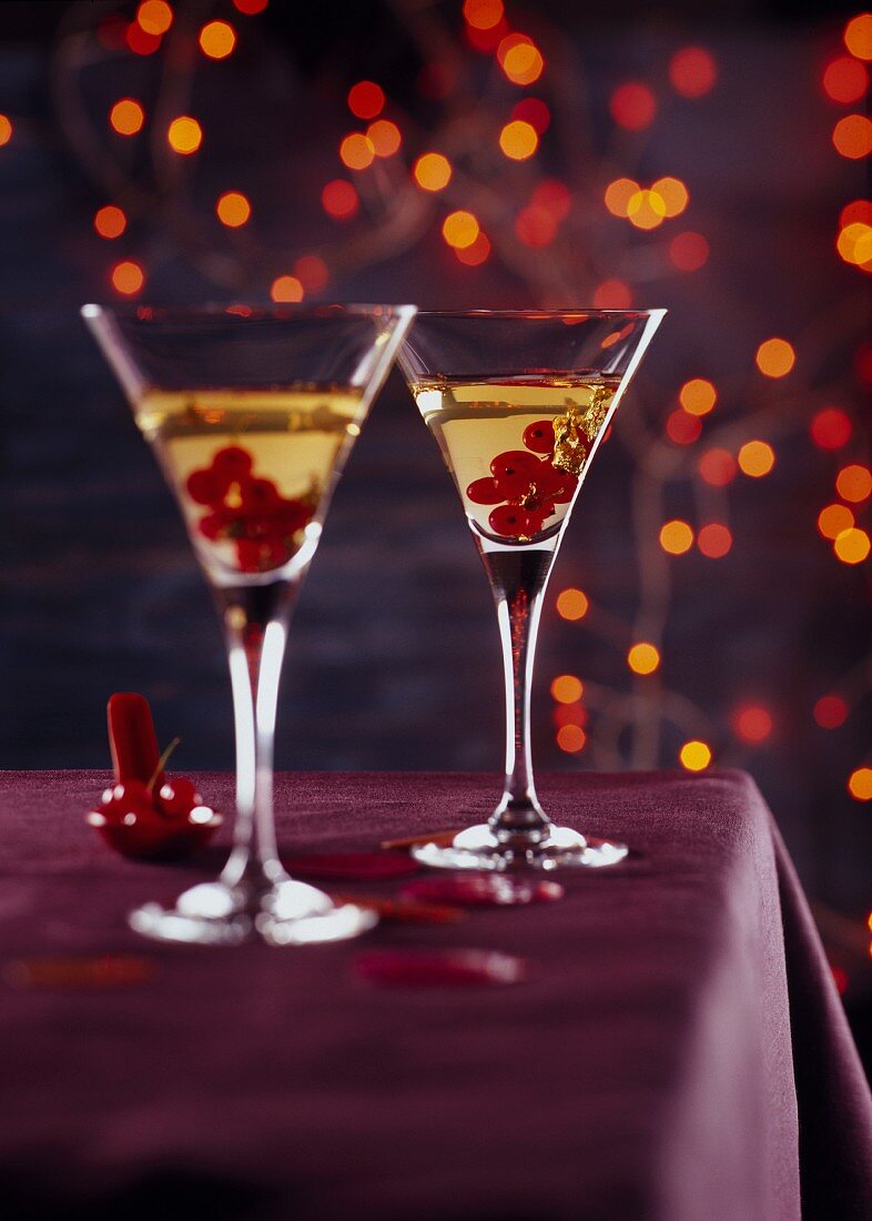 Redcurrant cocktails with golden leaves