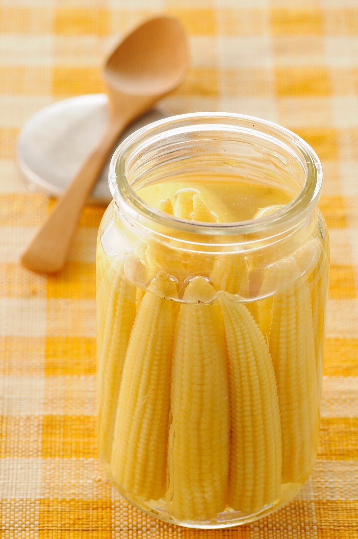 Jar of mini corn on the cobs