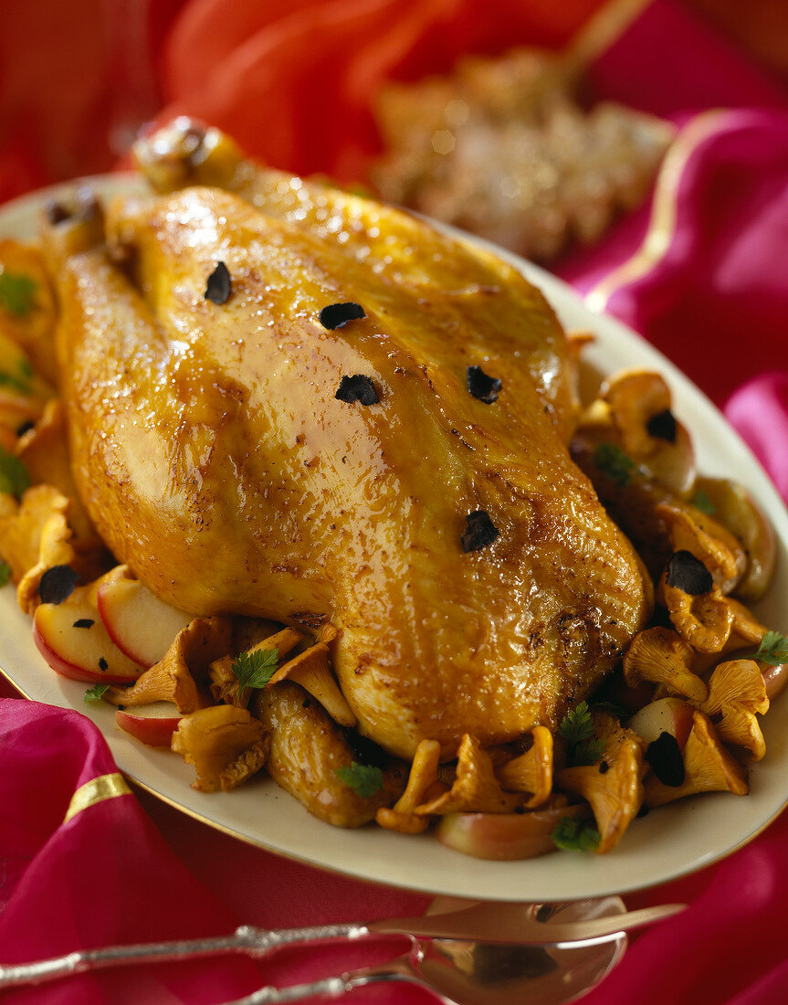 Capon with trufles,chanterelles and apples