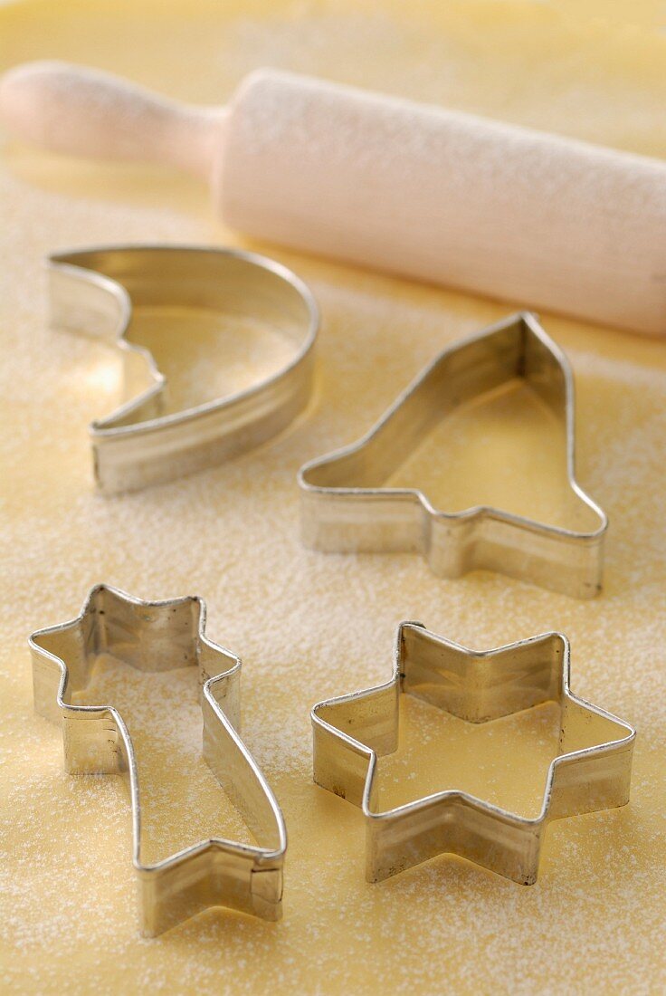 Different shaped biscuit cutters and rolling pin