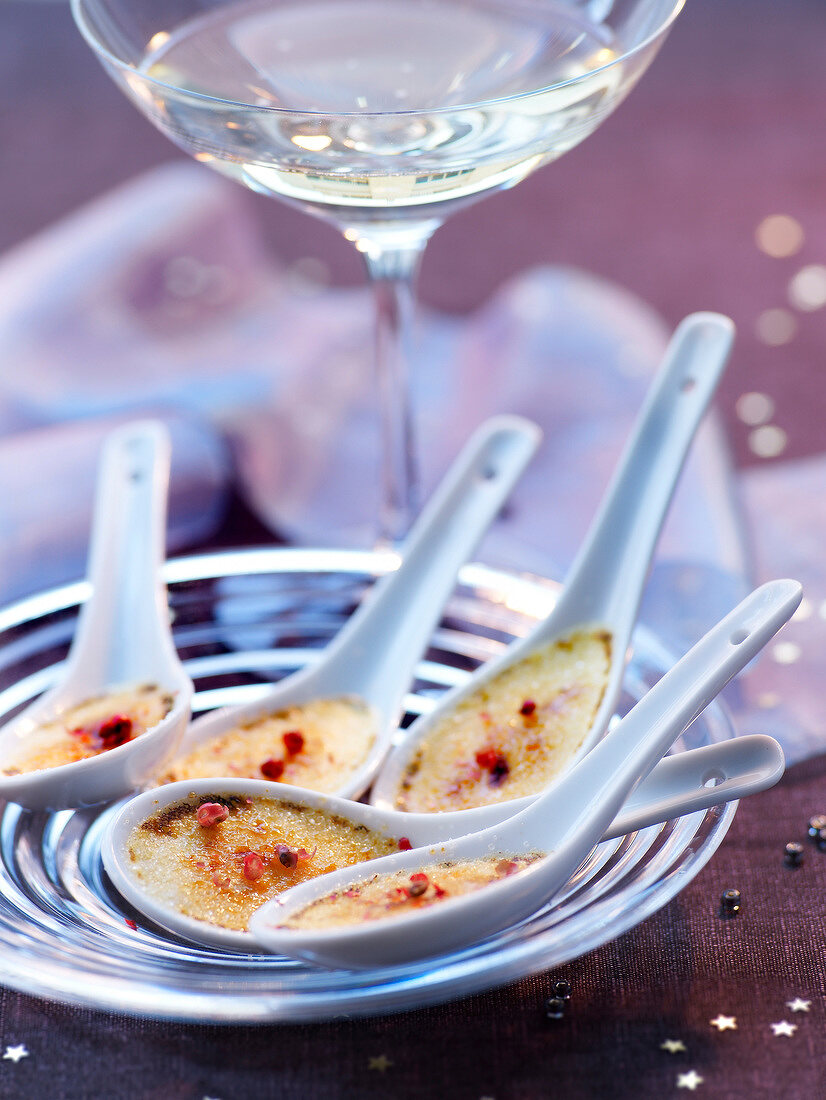 Aperitif spoons of Creme brulée with red pepper