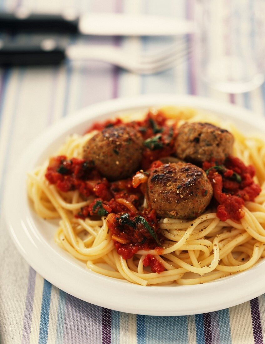 Meat balls in tomato sauce with spaghetti