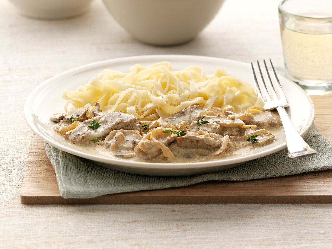 Veal with onion and cream sauce,tagliatelles