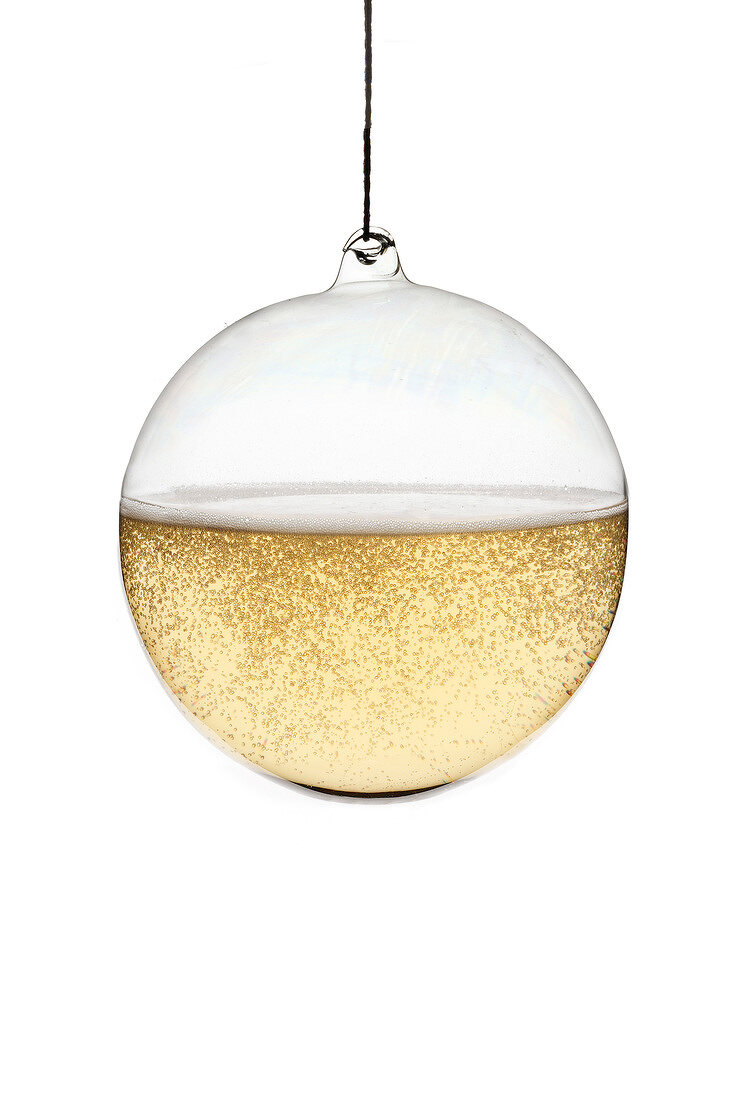 Christmas glass ball decoration full of champagne