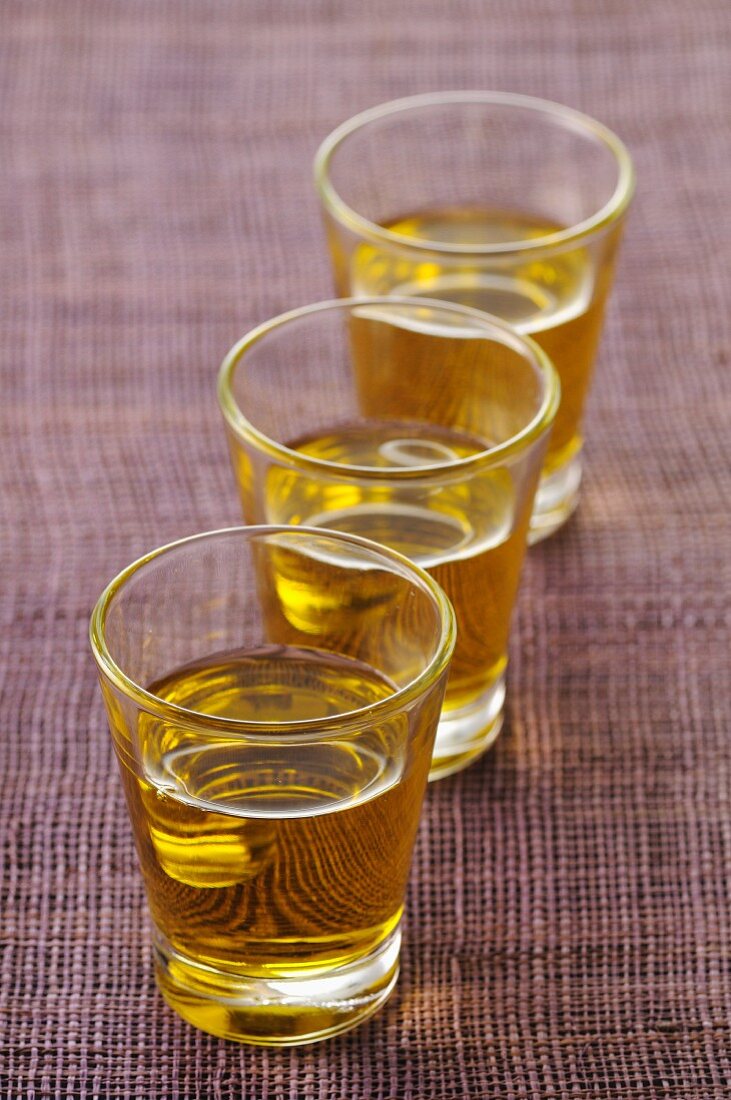 Glasses of olive oil