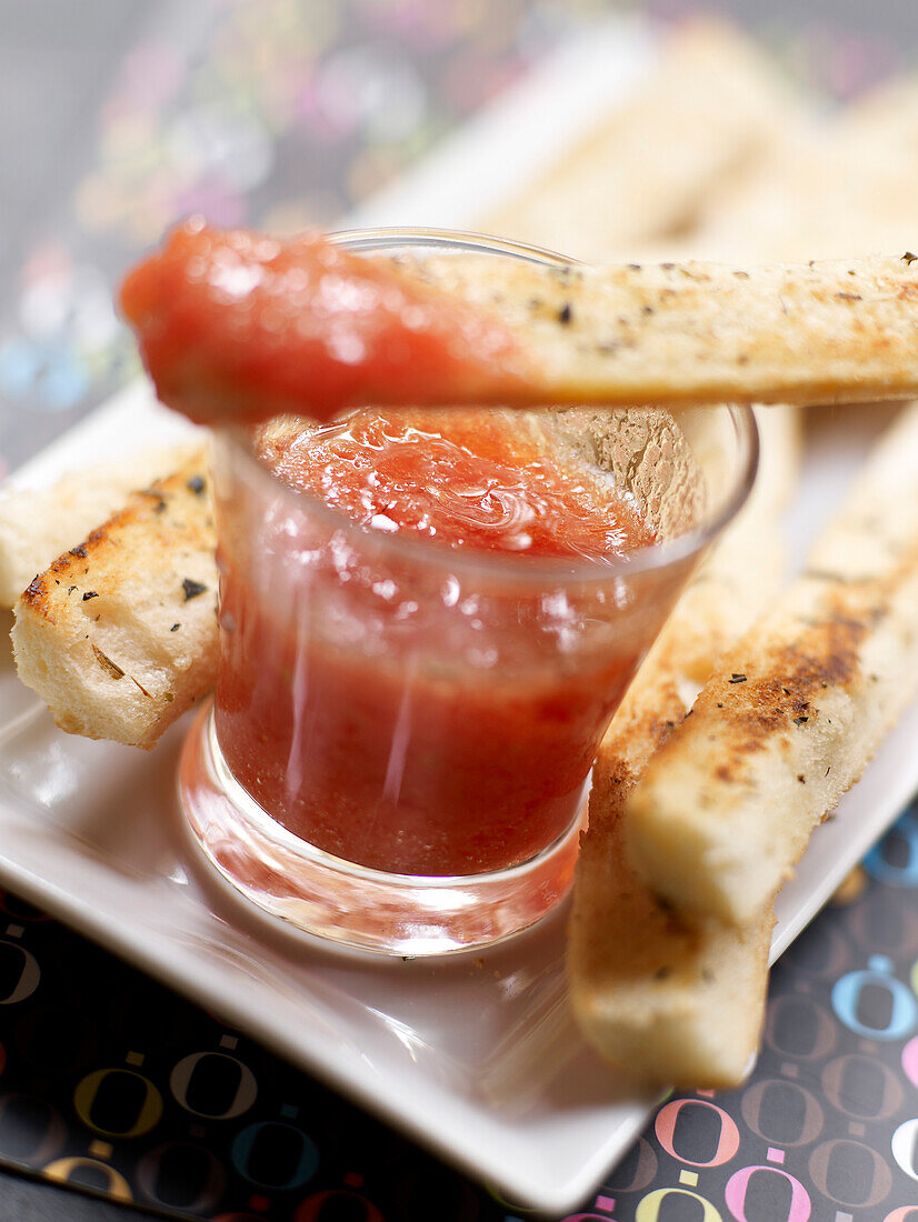 Gaspacho with bread fingers