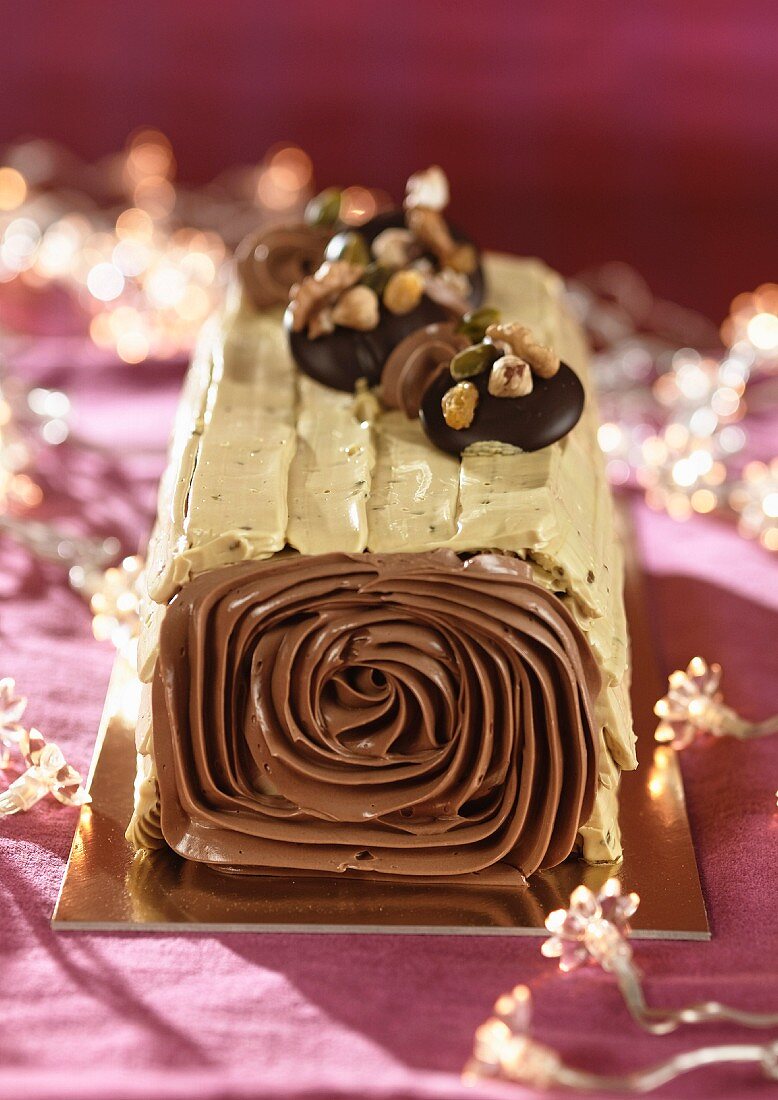 Chocolate and pistachio Christmas log cake