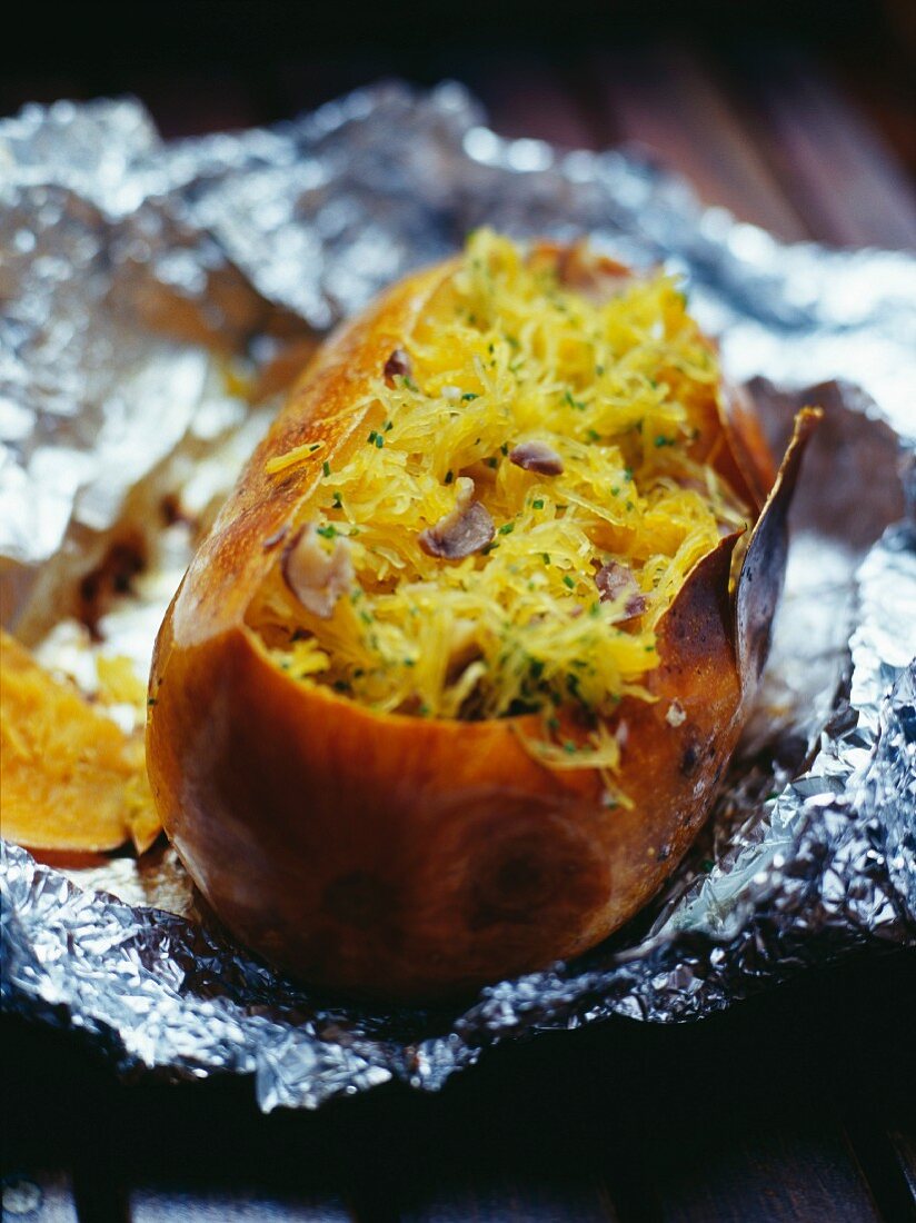 A baked potato filled with vermicelli and ginger