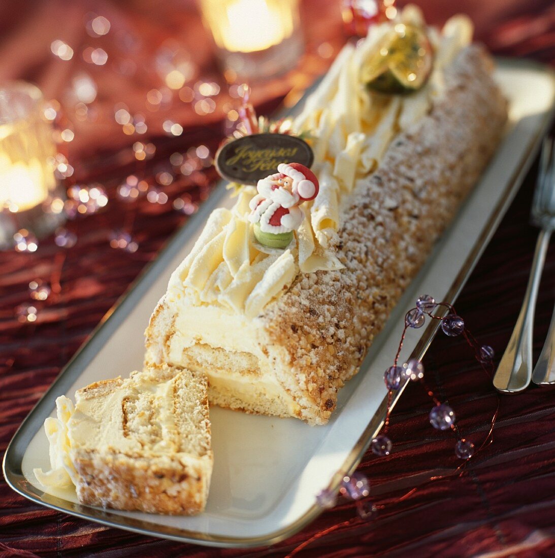 Vanilla, white chocolate and hazelnut Christmas log cake