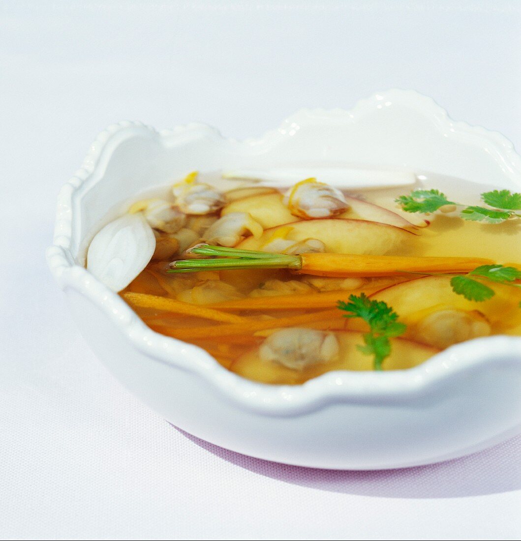 Fish stock with clams and carrots