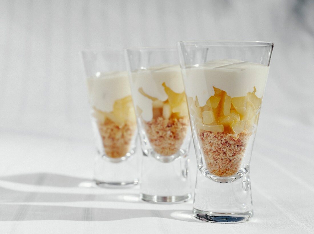 A layered dessert made with cream, pears, Breton shortbread and white chocolate