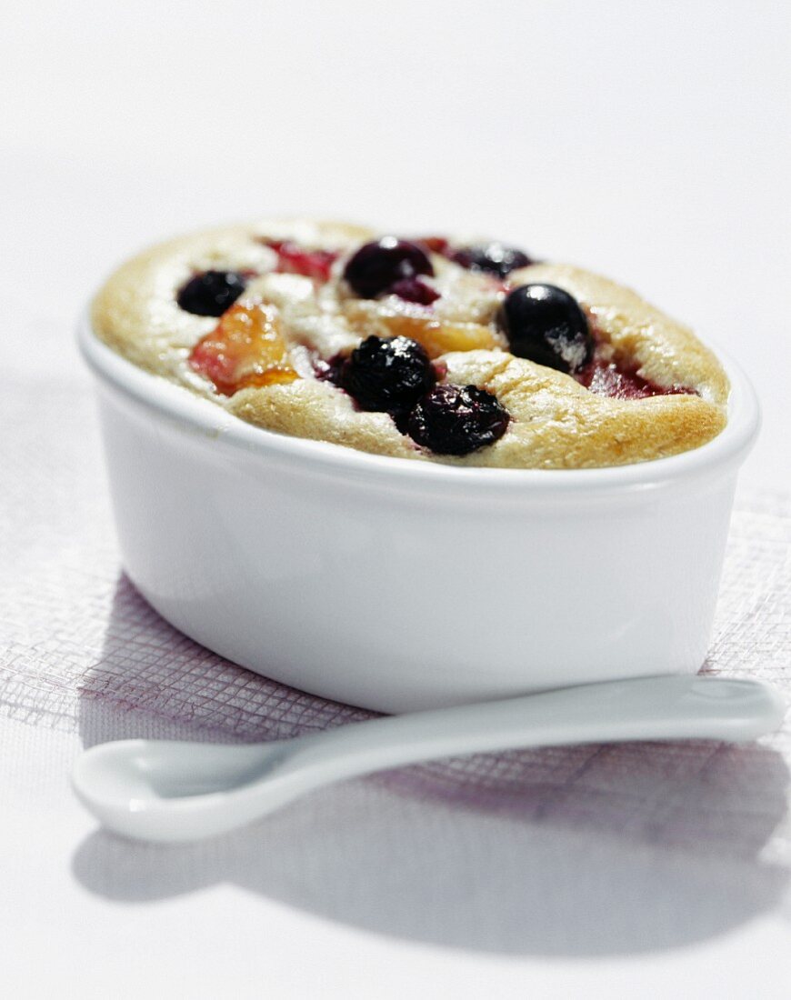 Sweet pudding with apples and blueberries