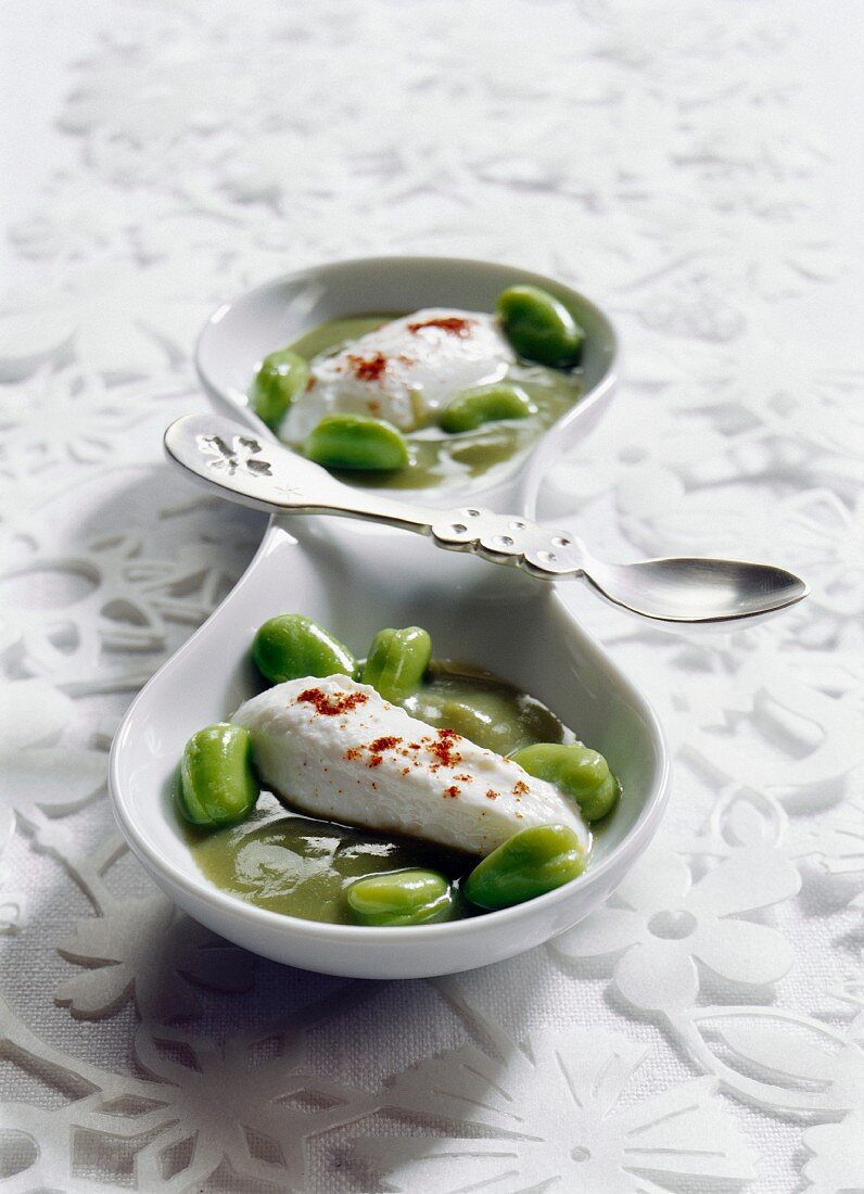 Broad bean and sage soup with goat's cream cheese dumplings and ground paprika