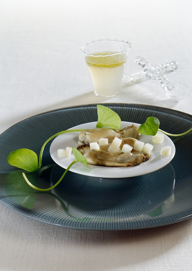 A warm oyster salad with green apple
