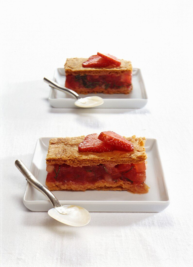 Mille feuilles with strawberries, tomatoes and herbs