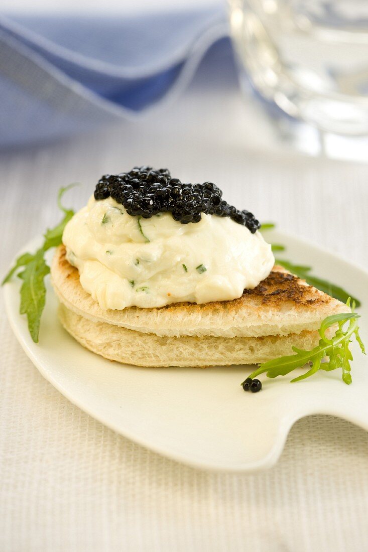 Caviar, cream cheese and herb canapé