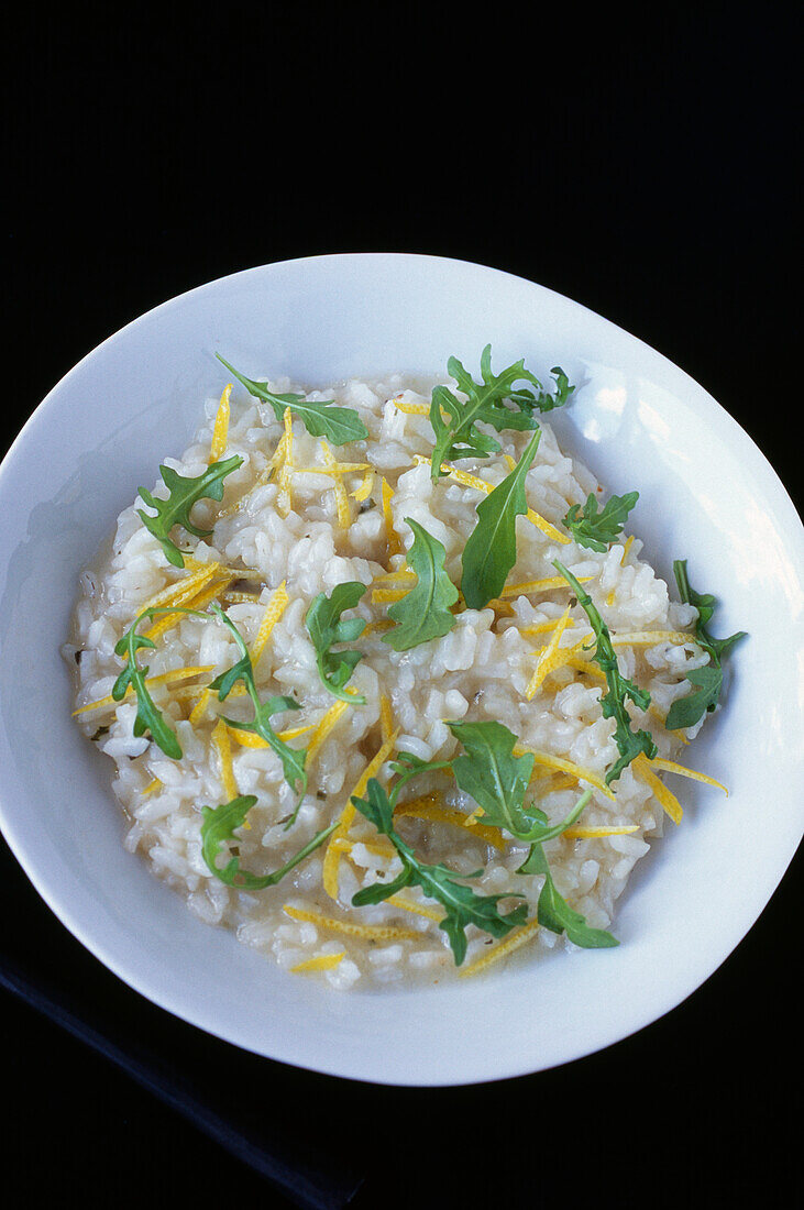 Risotto with lemon zests and rocket