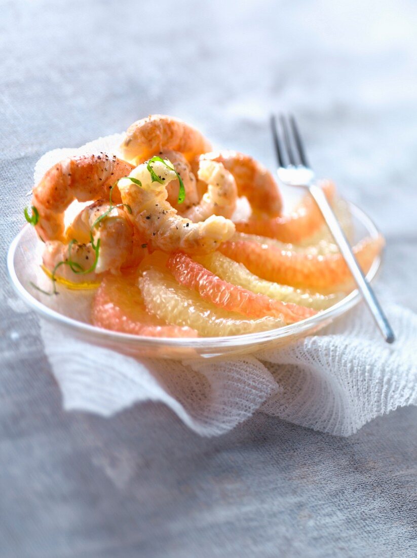 Dublin Bay prawns with yellow and pink grapefruit segments