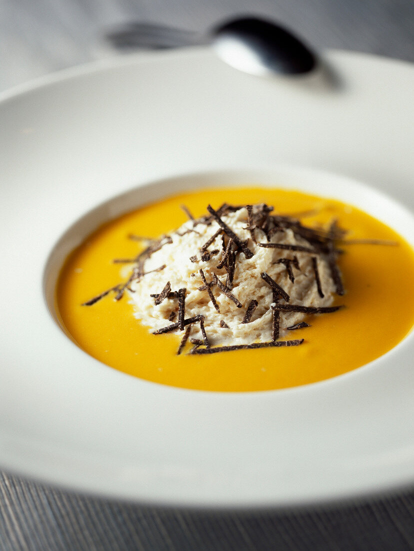 Cream of pumpkin soup with bacon mouuse and truffles