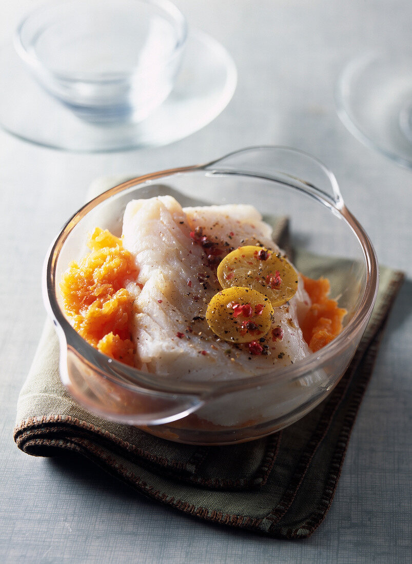 Piece of cod with confit citrus and pink peppercorns,mashed pumpkin